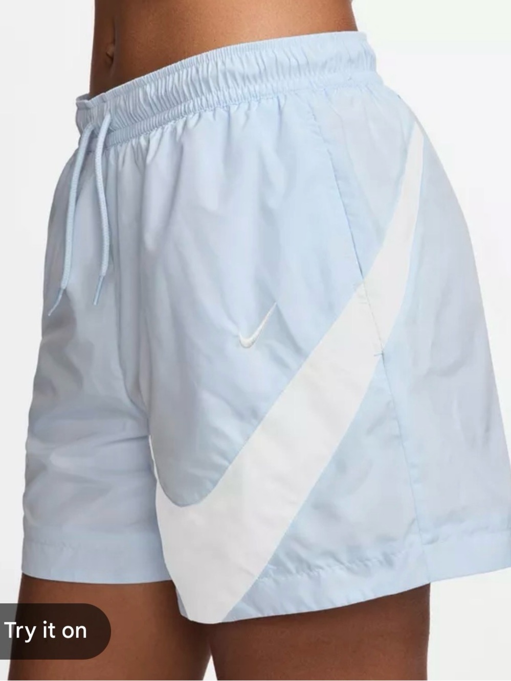 Nike Light Blue Women's Athletic Shorts with White Swoosh Accent